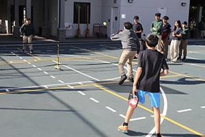 Boys playing Pickleball